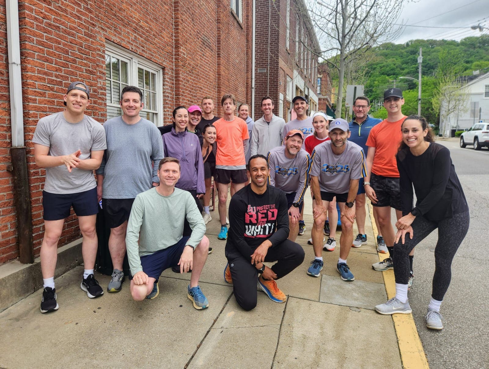 A large group of Sewickley Run Club members gathered before a spring Tuesday run